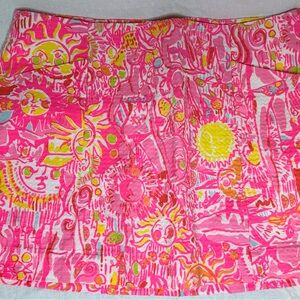 Lilly Pulitzer bright skirt. Sun pattern.